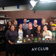 Susie “S.E.” Hinton (center), surrounded by admirers from the Onion offices on The A.V. Club set